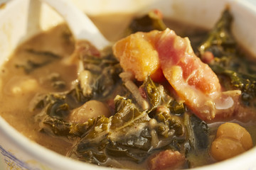 a cup of West African Peanut, Yam, and Collard Green soup sold by a Pennsylvania food truck