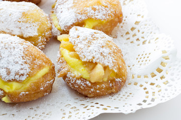 Handmade krapfen filled with pastry cream