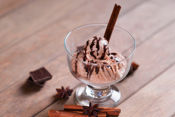 Ice cream sundae, spices and chocolate pieces