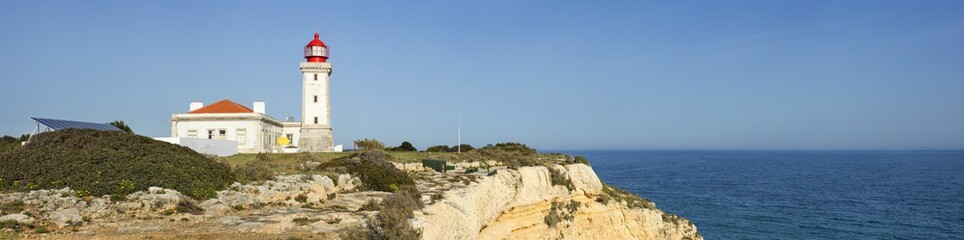 Fototapeta na wymiar panorama with lighthouse and blue sea