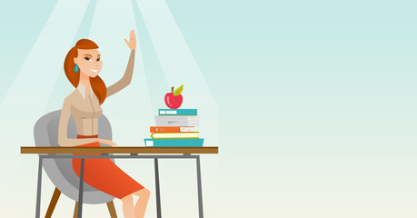 Fototapeta premium Student raising hand in class for an answer.