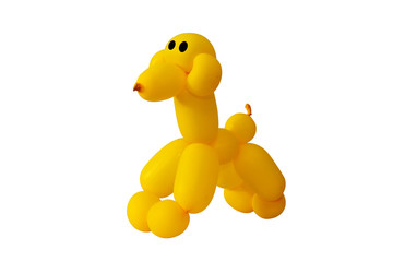 Twisted yellow balloons are dog shaped on white background