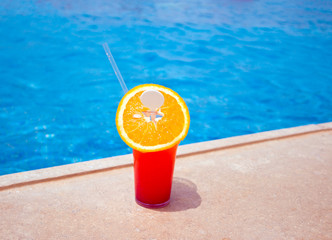 Fruit cocktail glass at pool