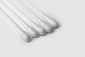 Close up cotton buds on white background.