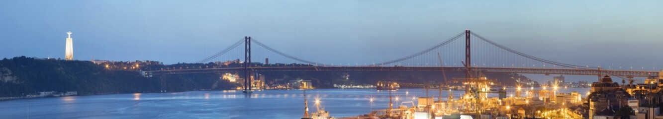 panorama with night Lisbon and bridge 