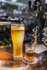 Beer glasses with beer on the bar 5