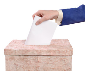Man throws ballots into the ballot box