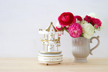 rosses in the vintage vase and carousel horses