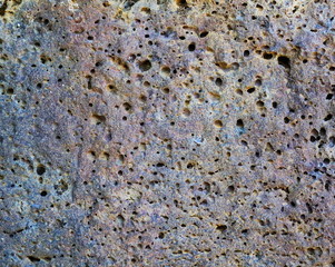 colorful volcanic stone wall  background, lava texture