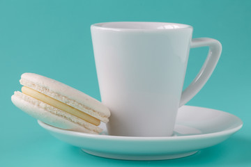 One macaroon and espresso coffee