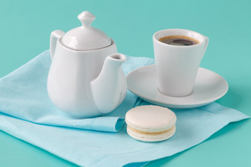 One macaroon and espresso coffee