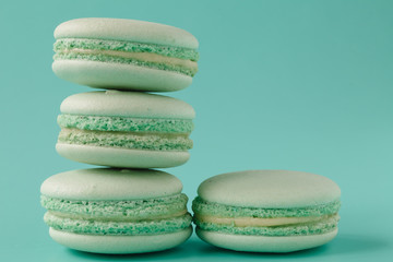 turquoise macaroons on aquamarine background