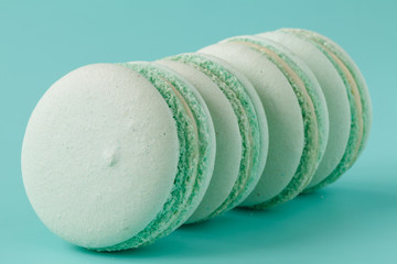 turquoise macaroons on aquamarine background