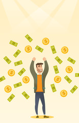 Happy busiessman under money rain.