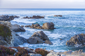 Fototapeta na wymiar Seascape of Monterey Bay at Sunset in Pacific Grove, California, USA