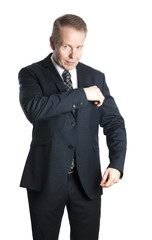 Middle-aged businessman in suit isolated on white background