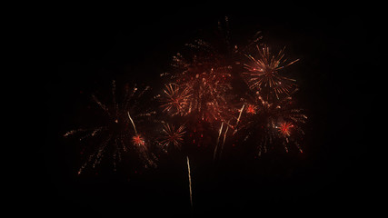 A set of slow motion fireworks on black background, isolated sequence animation without cropping, collage of colorful fireworks exploding in the night sky.