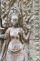 Dancing Apsaras an old Khmer art carvings on the wall in Angkor Wat temple near Siem Reap town, Cambodia