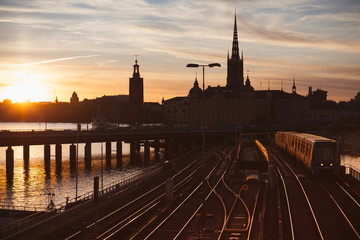 Evening cityscape with subway train