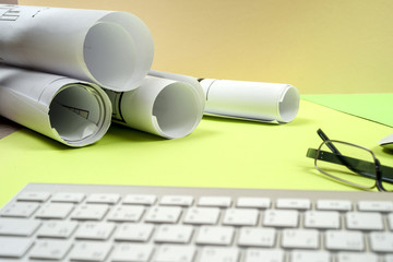 Workplace of architect - rolls and plans.