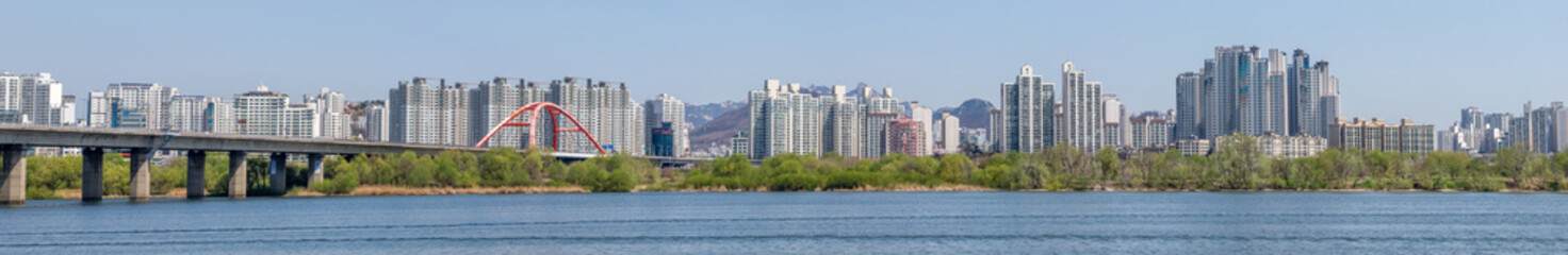 Fototapeta na wymiar Panorama of a portion of the skyline of Seoul, South Korea with the Han River