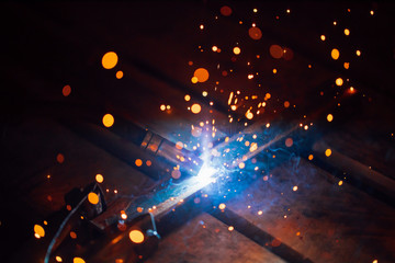 artistic welding sparks light, industrial background