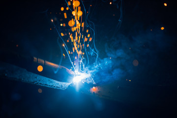 artistic welding sparks light, industrial background
