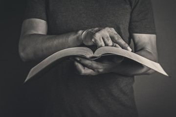 Men reading the Holy Bible