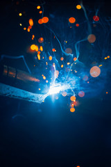 artistic welding sparks light, industrial background