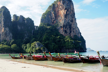 Fototapeta premium longtail boats on railay beach, krabi, thailand