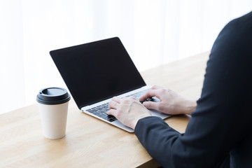 asian businesswoman using laptop