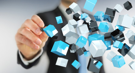 Businessman holding floating blue shiny cube network 3D rendering