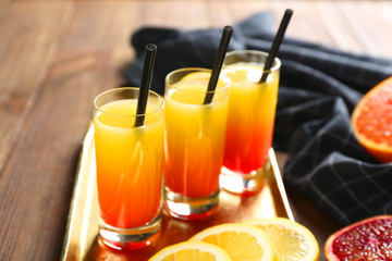 Delicious tequila sunrise cocktails on tray