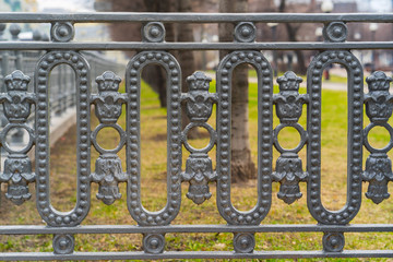 classic decorative fences in street Moscow, Russia. closeup