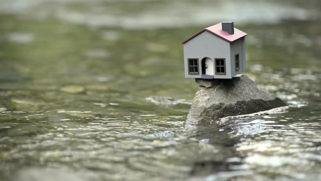 Model house in the river.