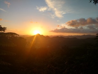 Sunset through mountain