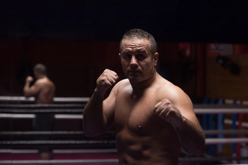 professional kickboxer in the training ring