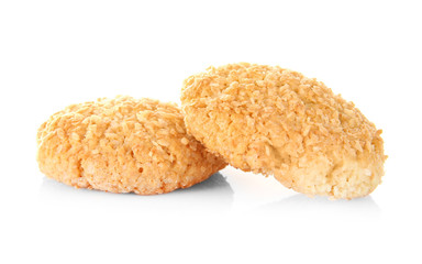 Delicious coconut cookies on white background