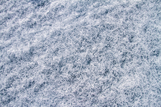 Texture of beautiful fairytale ice of the lake Baikal in the winter.
