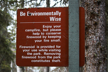 Be Environmentally Wise sign asking to conserve wood