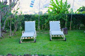 Easy chair on a garden lawn