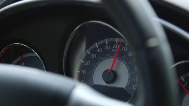 Close-Up Of Speedometer While Driving