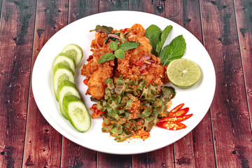 Spicy crispy deep-fried chicken salad.