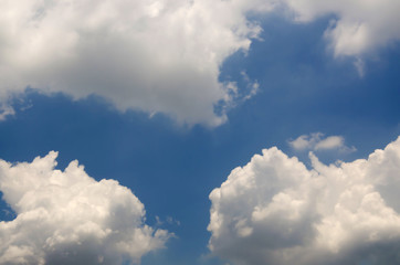 Blue sky with white cloud and partial dark clouds. Sky cloud. 