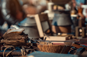 old torn books counter in sunday flea market. Antique bazaar