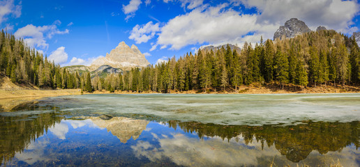 Spring view at Lago Antorno, Dolomites, Lake mountain landcape with Alps peak reflection, Misurina, Cortina d'Ampezzo, Italy