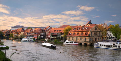 Scenic summer panorama at sunset of the Old Town pier in Bamberg, Bavaria, Germany. Panorama.