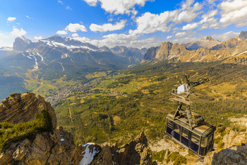 Aerial spring view from Faloria on Cortina Valley and cable car in Dolomites, Italy - Cortina D'Ampezzo at Tondi al Faloria