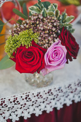 Colorful bouquet in a vase on the table 7958.