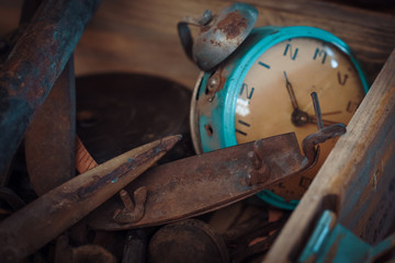 macro rusty metal parts and old broken clock in sunday flea market